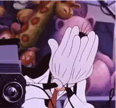 Goofy covers his eyes then peeks