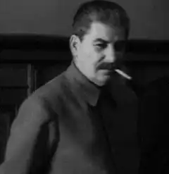 Stalin smoking and waving