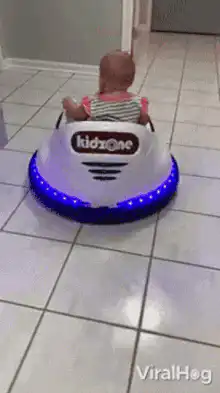 Baby driving bumper car