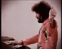 Bob Ross playing keyboard