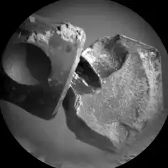 Two rocks colliding in space