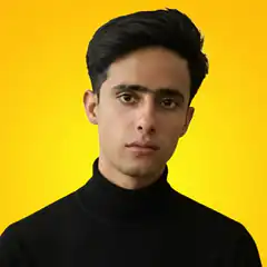 Man in black turtleneck on yellow background