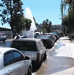 Giant water geyser erupts on street