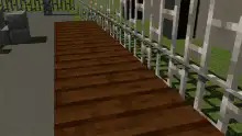 Sonic sitting on a wooden bridge