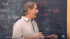 Jon Hamm explains comedy on chalkboard