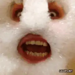 Man screaming with face covered in foam