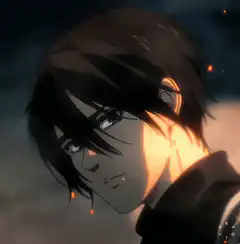Eren Yeager looking up with fire