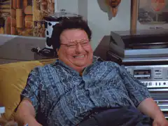 Cosmo Kramer laughing hysterically