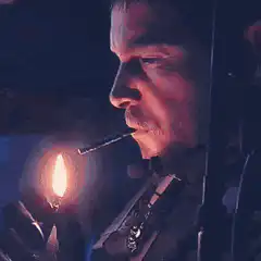Daredevil lights a cigarette
