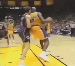 Kobe Bryant dunk over defender