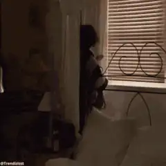 Woman dramatically throws head back