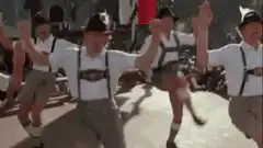 Men in lederhosen dancing