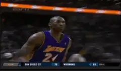 Kobe Bryant looking up and walking