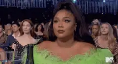 Lizzo looking unimpressed at awards show
