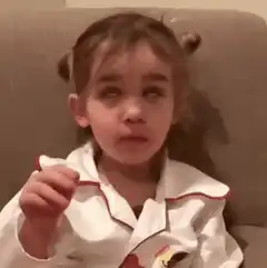 girl in pajamas rolling eyes