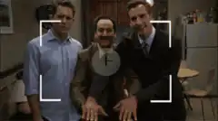 Three men posing for a photo with a camera viewfinder overlay
