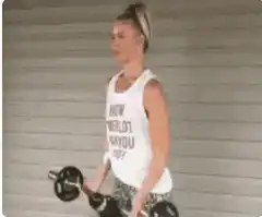 woman drinking wine from barbell
