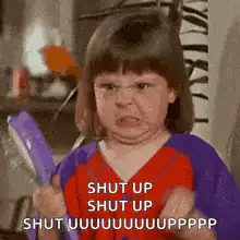Angry girl with hairbrush shouting shut up