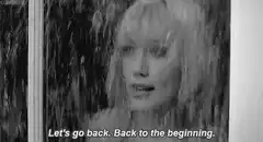 Woman in rain says let's go back