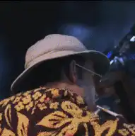 Vincent Vega turns around smoking