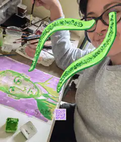 Artist with green tentacles