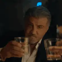 Sylvester Stallone raises a glass