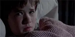 Haley Joel Osment crying in bed