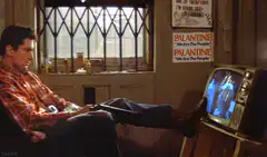 Tom Hanks in Cast Away watching TV