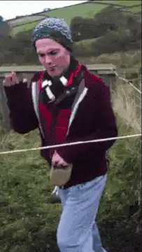 man pulled into stream by rope