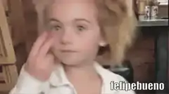 Girl rubbing eye then peeking