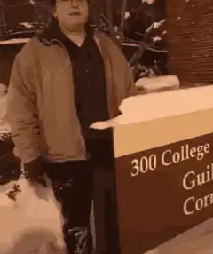 Person falls over sign in snow