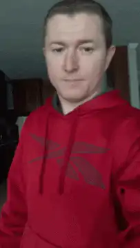 Man reacts to yellow device