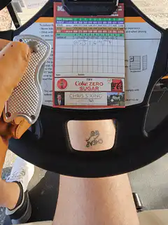Glove holding knife on Yamaha golf cart