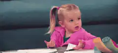 confused little girl shrugging