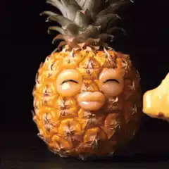 Pineapple with face eating banana