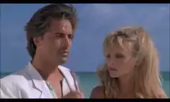 Michael Douglas puts on sunglasses