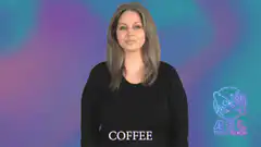Woman signing coffee in ASL