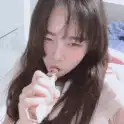 Girl smoking and blowing smoke