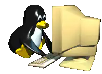 Tux the Linux Penguin at a computer