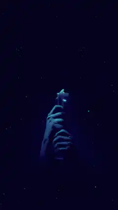 Blue lightsaber ignites in space