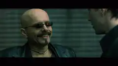 Agent Smith smirks at Neo
