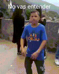Boy dancing with Spanish captions