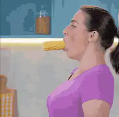 Woman eating corn on the cob