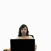 Woman gets excited at laptop