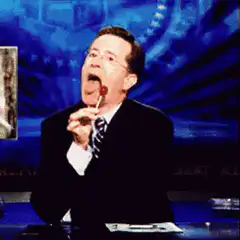 Stephen Colbert eating lollipop