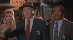 Men facepalming in suits