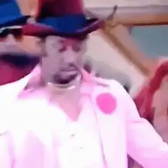 Uncle Jesse in pink suit dancing