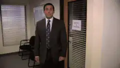 Michael Scott bowing in office