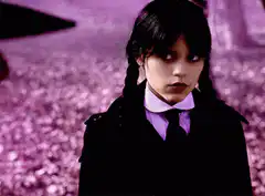 Wednesday Addams side eye smirk