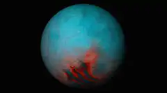 Rotating blue planet with red surface features